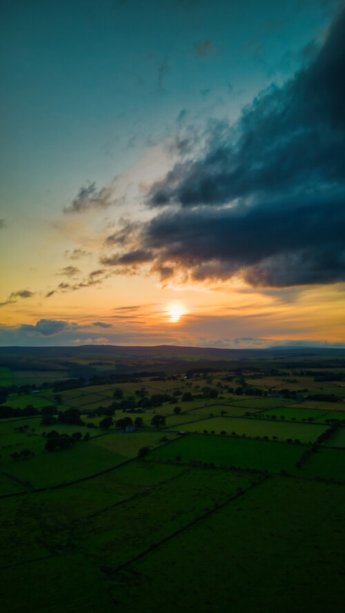 Scenic aerial view of the sunset above the land in Yorkshire.